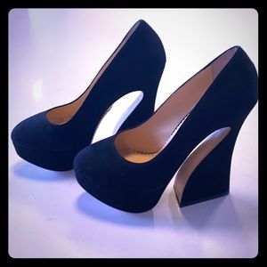 Chunky heel platform pumps.